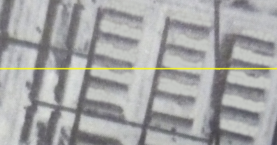 Detail of aerial of hospital with latitude line